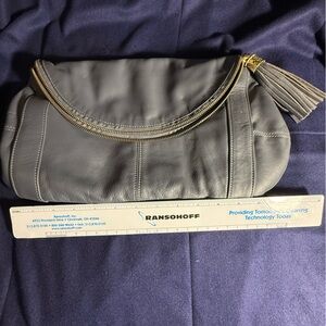 Medium gray Onna Ehrlich clutch bag.